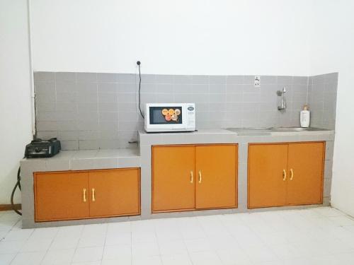Virtuvė arba virtuvėlė apgyvendinimo įstaigoje Hostel Bogor