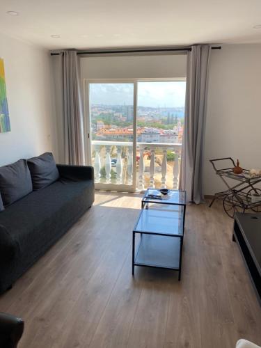 Χώρος καθιστικού στο Suites Setúbal - River View