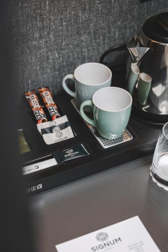 Tetera y cafetera en SIGNUM Hotel