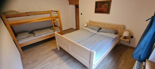 Postel nebo postele na pokoji v ubytování Apartma Vidic
