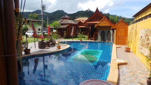 Gallery image of Golden Teak Resort Baan Sapparot in Kamala Beach