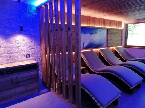 Posezení v ubytování DOLOMITES B&B - Suites, Apartments and SPA
