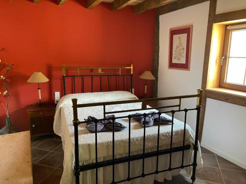 Säng eller sängar i ett rum på La Perera - Alojamiento turístico