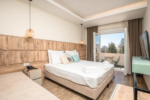 Postel nebo postele na pokoji v ubytování Hotel Olea