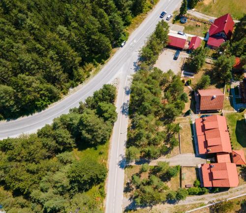 an aerial view of a road with houses and trees at Vikendica ''CASA DE TARA'' - Planina Tara in Kaludjerske Bare