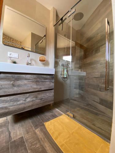 a bathroom with a shower and a sink at Little Bali Javea in Jávea