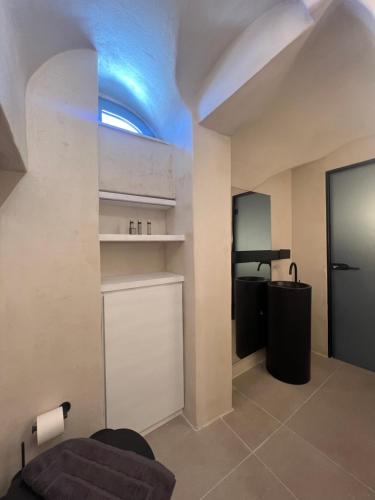 Nhà bếp/bếp nhỏ tại ArmonOia Suites