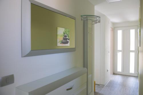 a living room with a picture on the wall at Villa Danex Premium in Umag