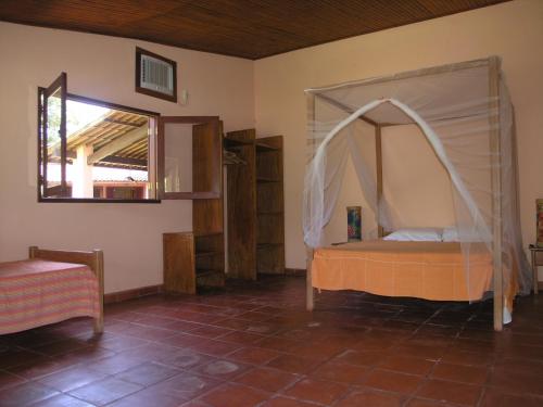 Postel nebo postele na pokoji v ubytování Sitio da Calma
