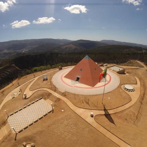 an aerial view of a pyramid in a park at Casa dos Copos - Drinks House in Miranda do Corvo