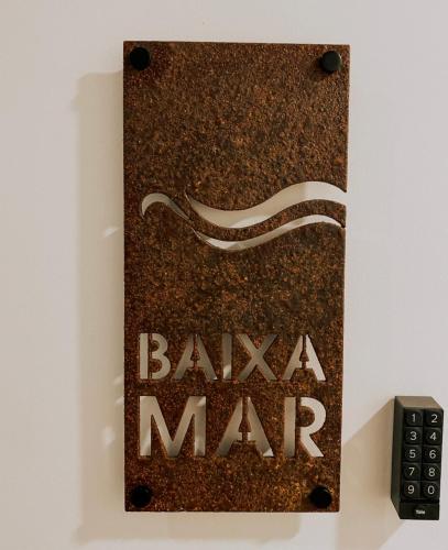 a sign for a bar maya man on a wall at Baixa-Mar Setúbal Miradouro in Setúbal