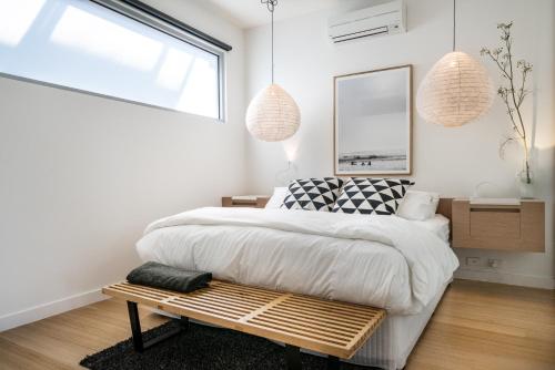 Ένα ή περισσότερα κρεβάτια σε δωμάτιο στο Aquabelle Apartments