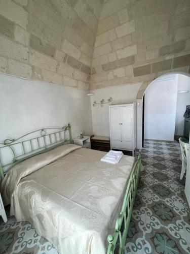 Postel nebo postele na pokoji v ubytování Le Dimore di TOTIGGIA 2.0