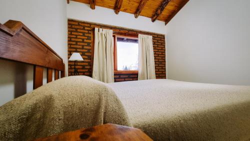 Postel nebo postele na pokoji v ubytování Departamento La Herreria