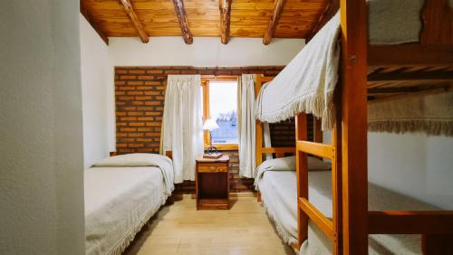 Postel nebo postele na pokoji v ubytování Departamento La Herreria