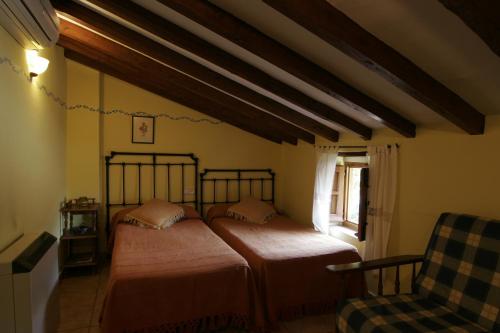 Ένα ή περισσότερα κρεβάτια σε δωμάτιο στο Casa Manadero