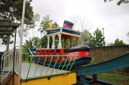 a slide at a playground with an inflatable at Aston Tanjung Pinang Hotel & Conference Center in Tanjung Pinang 