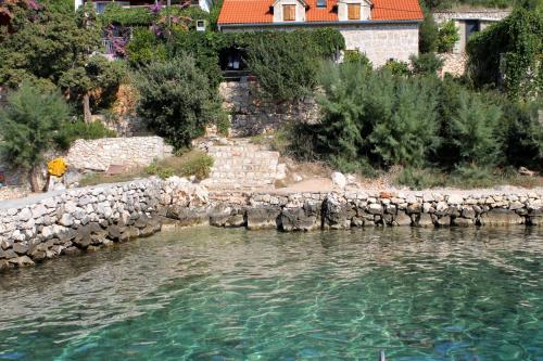 Fotografia z galérie ubytovania Seaside apartments with a swimming pool Mudri Dolac, Hvar - 4050 v destinácii Vrbanj