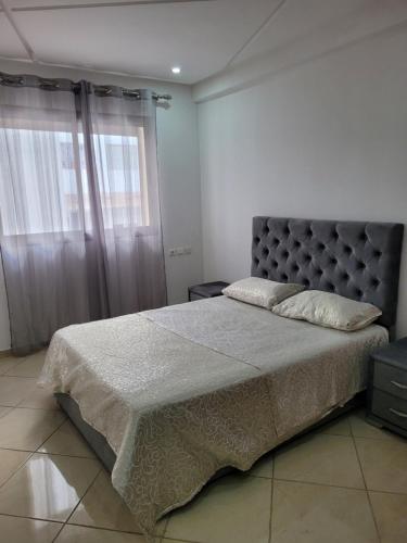 Postel nebo postele na pokoji v ubytování Résidence Machallah