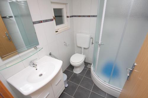 Kúpeľňa v ubytovaní Apartment Pisak 4815d