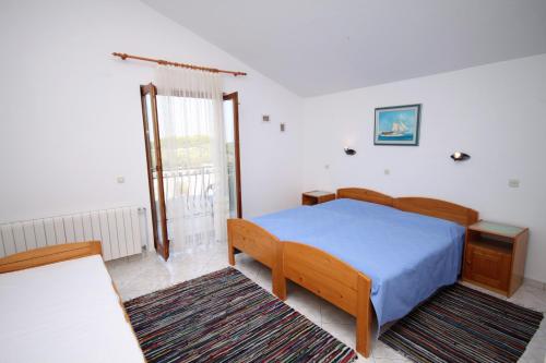 Posteľ alebo postele v izbe v ubytovaní Triple Room Gornje selo 5170e