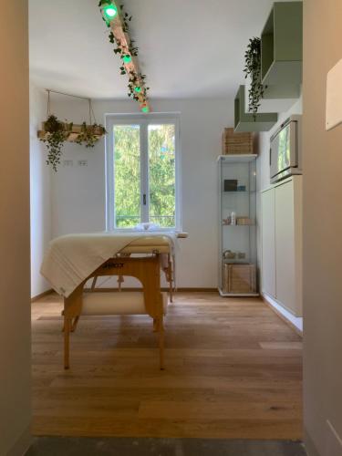 a room with a bed and a window at Ca Meison in Cannobio