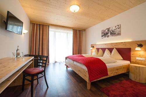 Postel nebo postele na pokoji v ubytování Hotel Brunnwirt