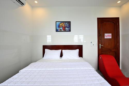 Ein Bett oder Betten in einem Zimmer der Unterkunft Ruby Hotel - Tân Uyên - Bình Dương