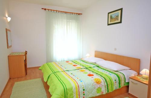 Apartments with parking space Palit, Rab - 5028