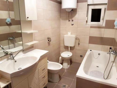 Koupelna v ubytování Family friendly apartments with a swimming pool Barbat, Rab - 4951