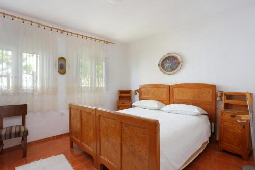 Postel nebo postele na pokoji v ubytování Apartments by the sea Cove Ostricka luka, Rogoznica - 4877