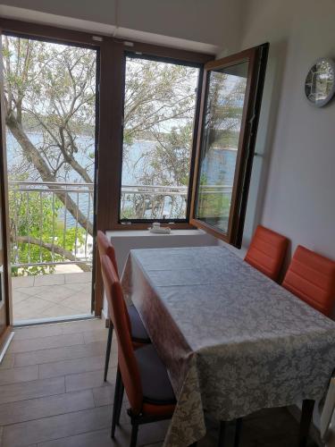 Apartments by the sea Barbat, Rab - 4975