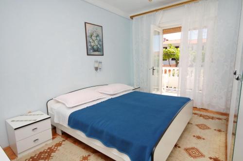 Postel nebo postele na pokoji v ubytování Apartments and rooms with parking space Palit, Rab - 5061
