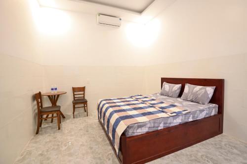 Ein Bett oder Betten in einem Zimmer der Unterkunft Ruby Hotel - Tân Uyên - Bình Dương
