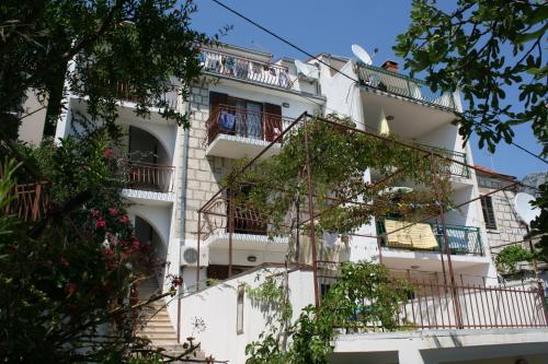 Fotografia z galérie ubytovania Apartments by the sea Podgora, Makarska - 6705 v Podgore