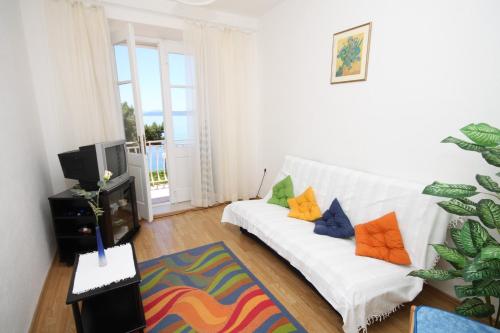 Televízia a/alebo spoločenská miestnosť v ubytovaní Apartments by the sea Podgora, Makarska - 6782