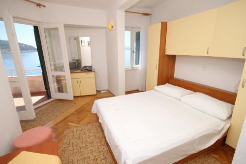 Apartments by the sea Podgora, Makarska - 6781
