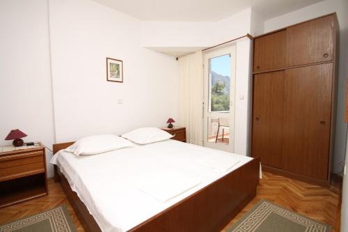 Apartments by the sea Podgora, Makarska - 6781