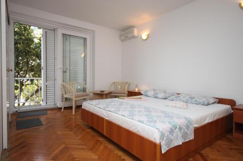 Apartments and rooms by the sea Makarska - 6839