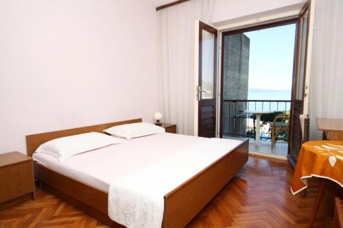 Apartments by the sea Podgora, Makarska - 6836