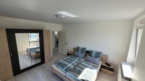 Katil atau katil-katil dalam bilik di Ferienwohnung Malbergblick klassifiziert mit 4 DTV-Sternen