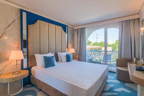 Postel nebo postele na pokoji v ubytování Bacolux Koralio, Eforie Nord