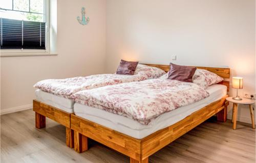 Postel nebo postele na pokoji v ubytování 2 Bedroom Pet Friendly Home In Stapel