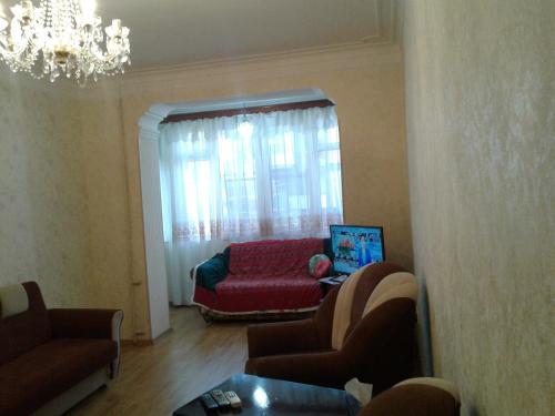 Coin salon dans l'établissement Baku Apartment
