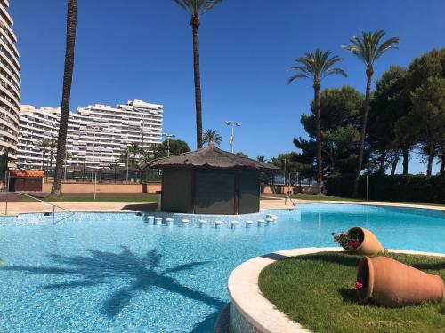 The swimming pool at or close to Cullera - Florazar II con piscina, tenis y club social
