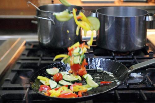 a plate of vegetables on top of a stove at Hotel-Restaurant Roter Ochsen in Lauchheim