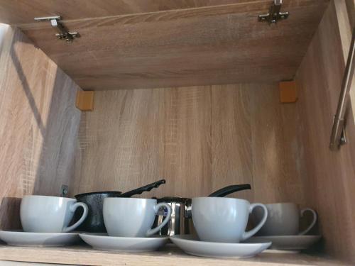 Kemudahan buat kopi dan teh di Apartman - 411