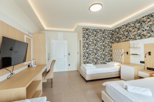 Ein Bett oder Betten in einem Zimmer der Unterkunft Apartments Belani Zelenika