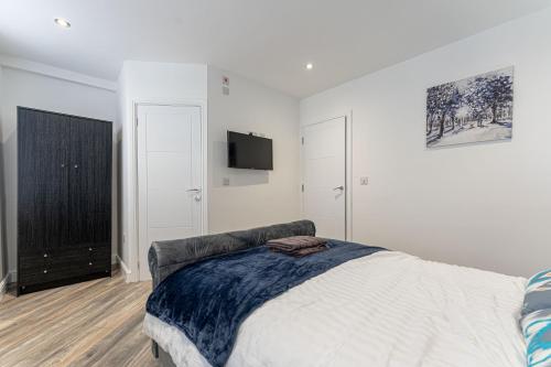 Ένα ή περισσότερα κρεβάτια σε δωμάτιο στο Tanna Estates - George Street House