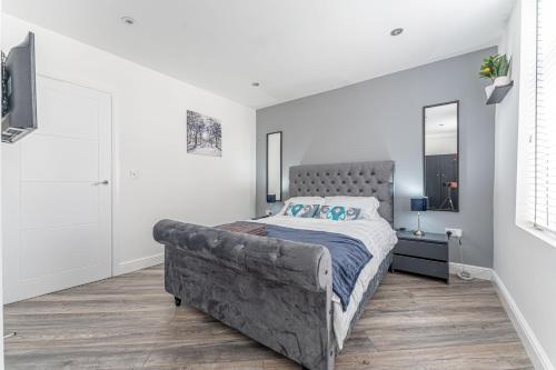 Ένα ή περισσότερα κρεβάτια σε δωμάτιο στο Tanna Estates - George Street House